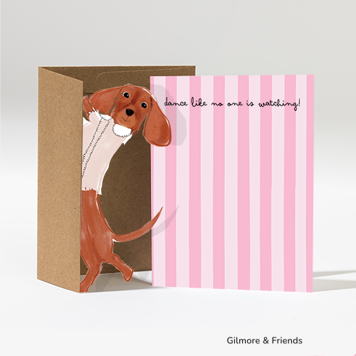 Gilmore & Friends greeting card with pink stripes and a dancing dachshund